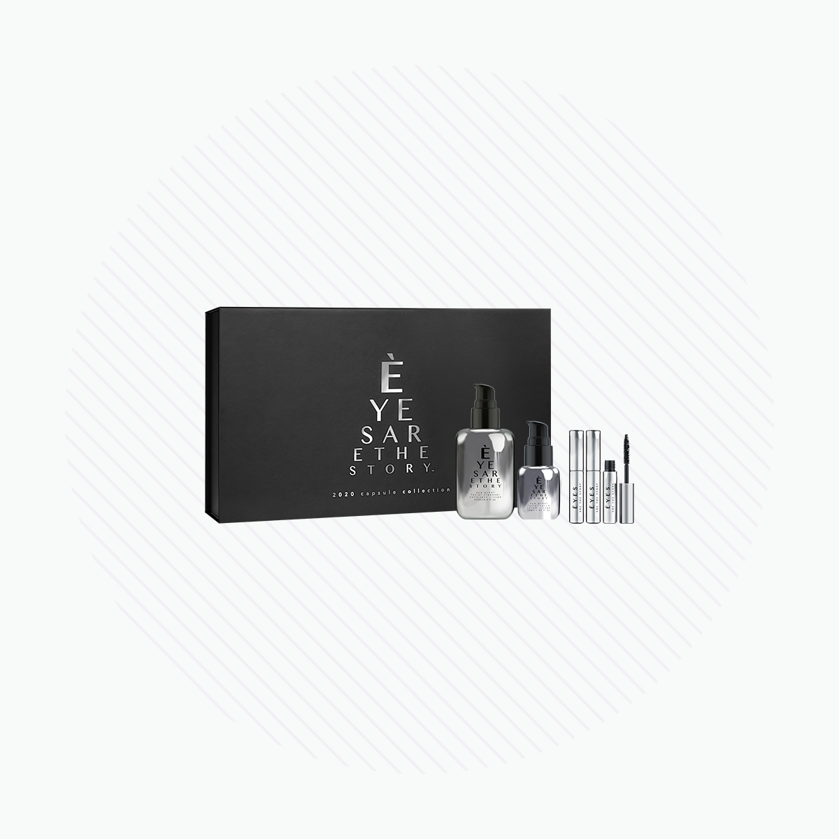 The Trinacria Collection by Eyes are the Story, featuring the Eye Proof Facial Cleanser, Serum, and Wipes, comes in a sleek black box with silver containers. These products are stylishly set against a white, striped circular backdrop.