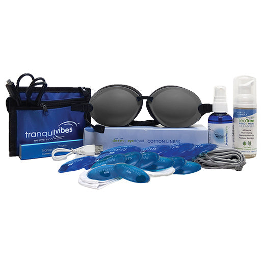 The Tranquilvibes eye care kit by EyeEco features goggles, blue nose pads, cotton liners, a spray bottle, a small liquid bottle, an electrical cord, and a black pouch. This collection is perfect for dry eye therapy and soothing moist heat treatment with over 1000 instant applications.