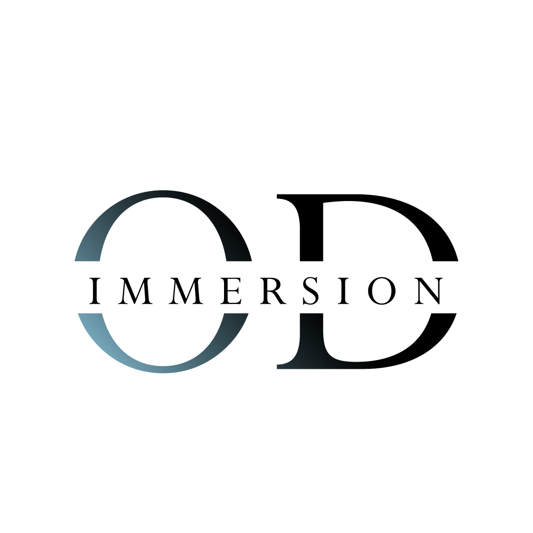 Stylized text logo displaying OD Immersion on a white background. The letter O is shaded with a gradient of blue, while the letter D is in black. Immersion is written in smaller, uppercase black letters across the center.