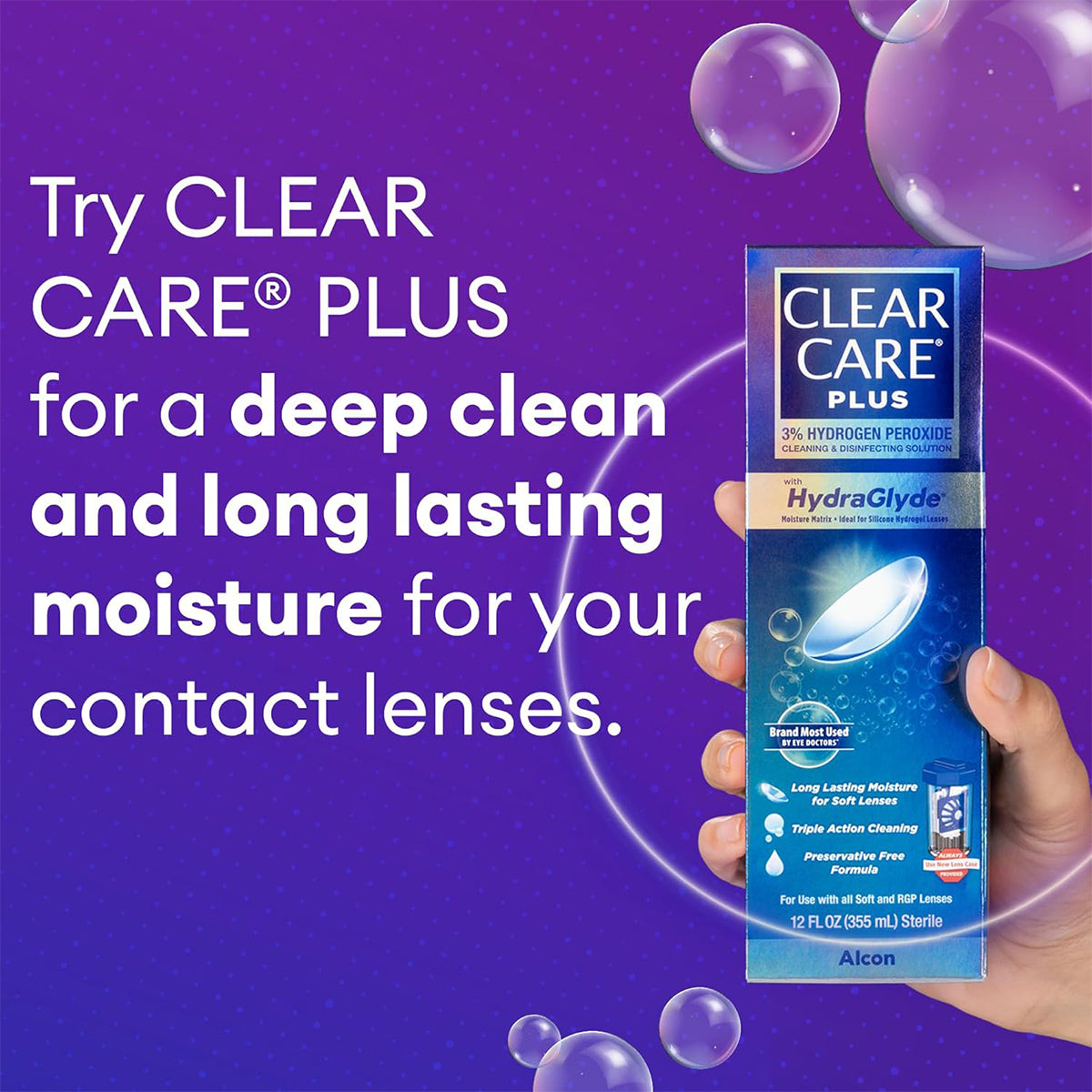 Ad for Alcons Clear Care Plus Cleaning Solution with Lens Case, 12 Oz. Reads: Experience Clear Care Plus with HydraGlyde for deep cleaning and lasting moisture. Image: hand holding the bottle against a purple bubble background.