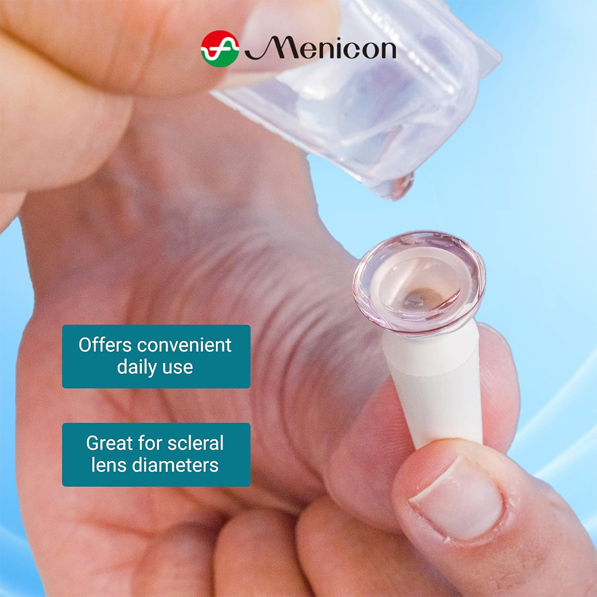 A hand holds a small device with a contact lens while preservative-free Menicon LacriPure Sterile Saline Solution is poured above. The text reads Offers convenient daily use and Great for scleral lenses. The Menicon logo is at the top.