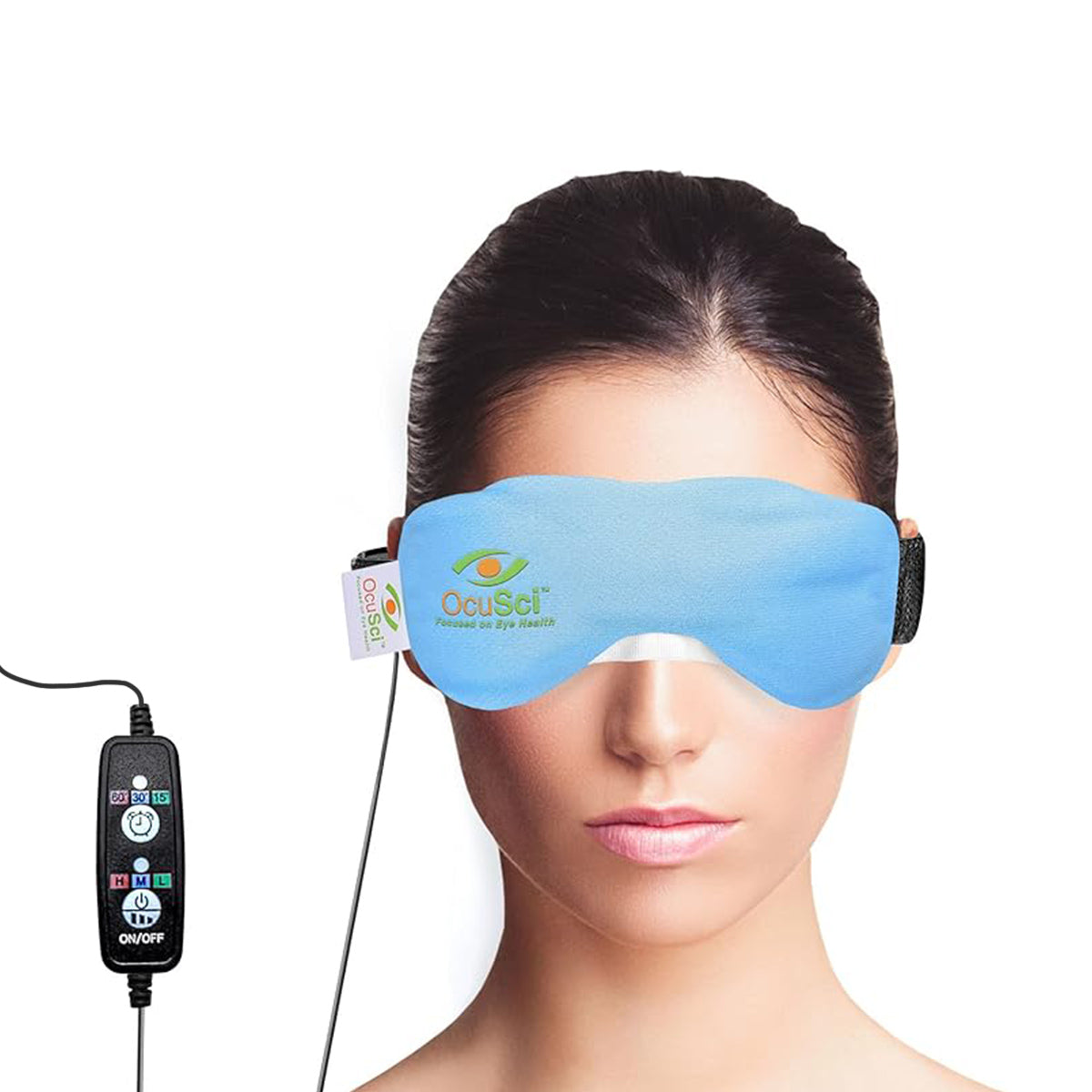 A woman wearing the OcuSci E-Compress USB Eye Heat Mask with a washable cover is connected by a wire to a control device featuring ON/OFF buttons and settings for therapeutic heat. It offers soothing dry eye relief and its USB-powered design ensures easy use anywhere.