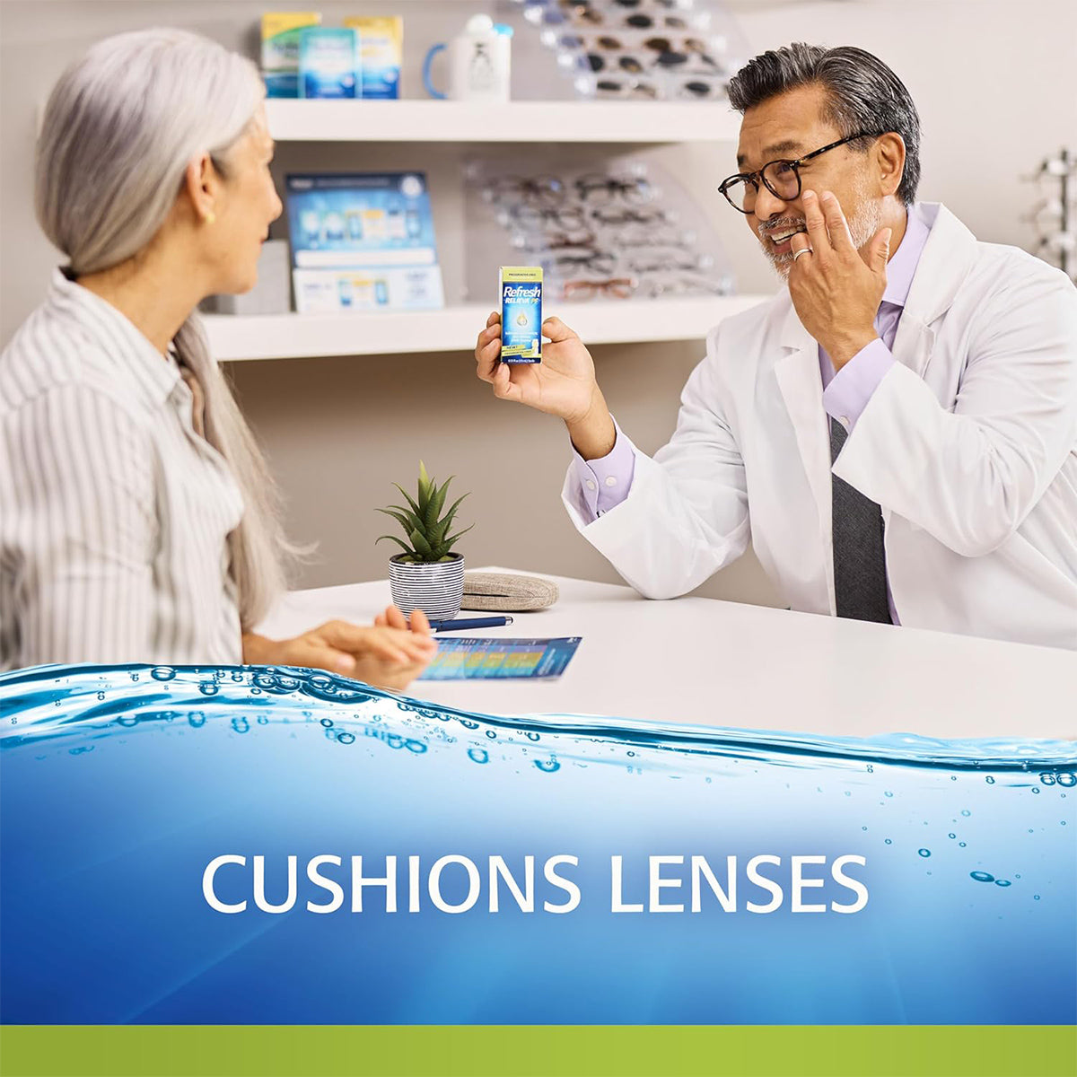 An optometrist in a white coat shows a smartphone to a woman with long gray hair at a table. Shelves of eye care products stand behind them, and in the foreground, a banner highlights Refresh Relieva for Contacts – Lubricant Eye Drops by Abbvie over a water theme for eye strain relief and lasting comfort.