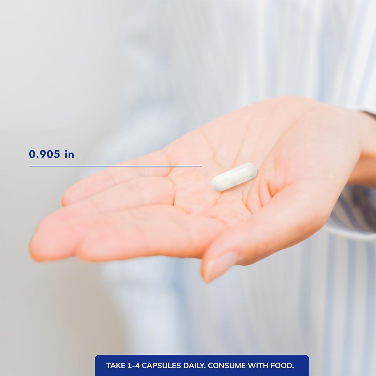 A hand holding a Pure Encapsulations Magnesium (Glycinate) capsule, 0.905 inches long, ideal for eye health and neuromuscular balance. A blue box reads, Take 1-4 capsules daily with food.