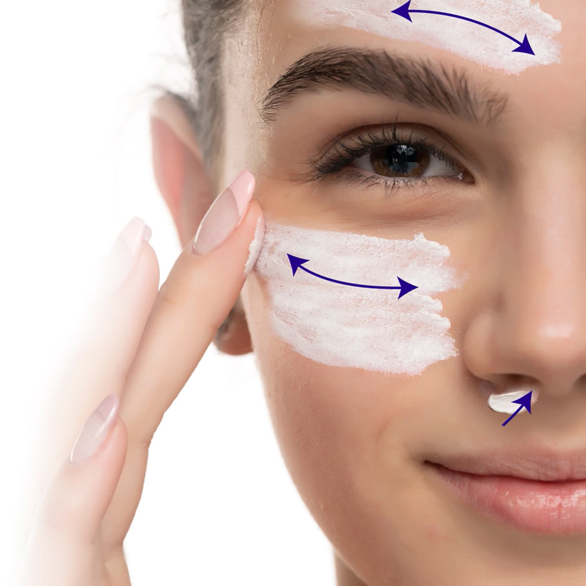 A person applies Barristrong Skin Cream for Sensitive Eyes and Irritated Eyelids by Omega 3 Innovations to their face, with blue arrows showing directions on the forehead, cheeks, and lips for enhanced nourishment.