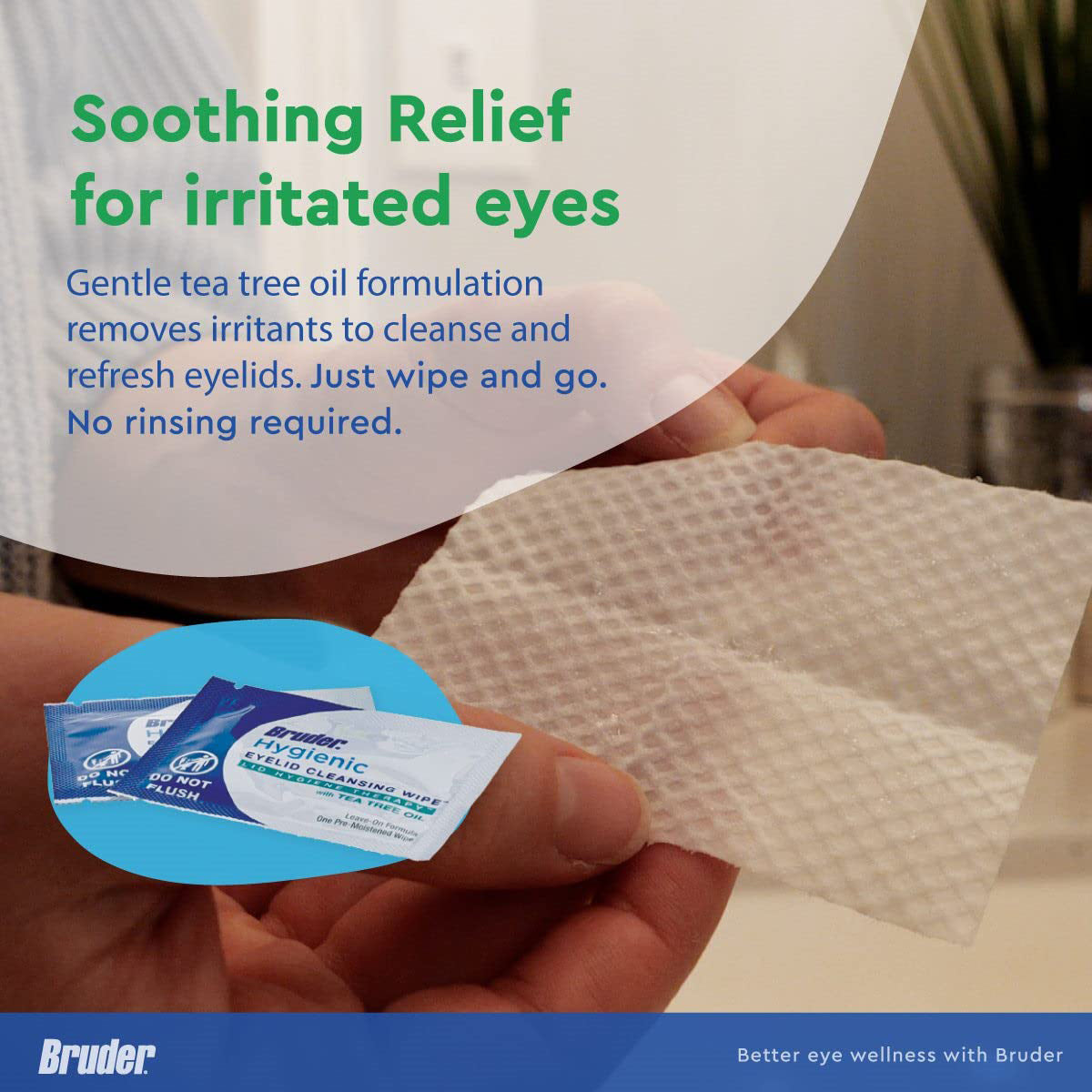 Someone holds a textured white wipe, with a package labeled Bruder Hygienic Eyelid Cleansing Wipes with Tea Tree Oil (30ct) nearby, promising Soothing Relief for Ocular Irritation. These wipes cleanse and refresh eyelids for optimal hygiene.