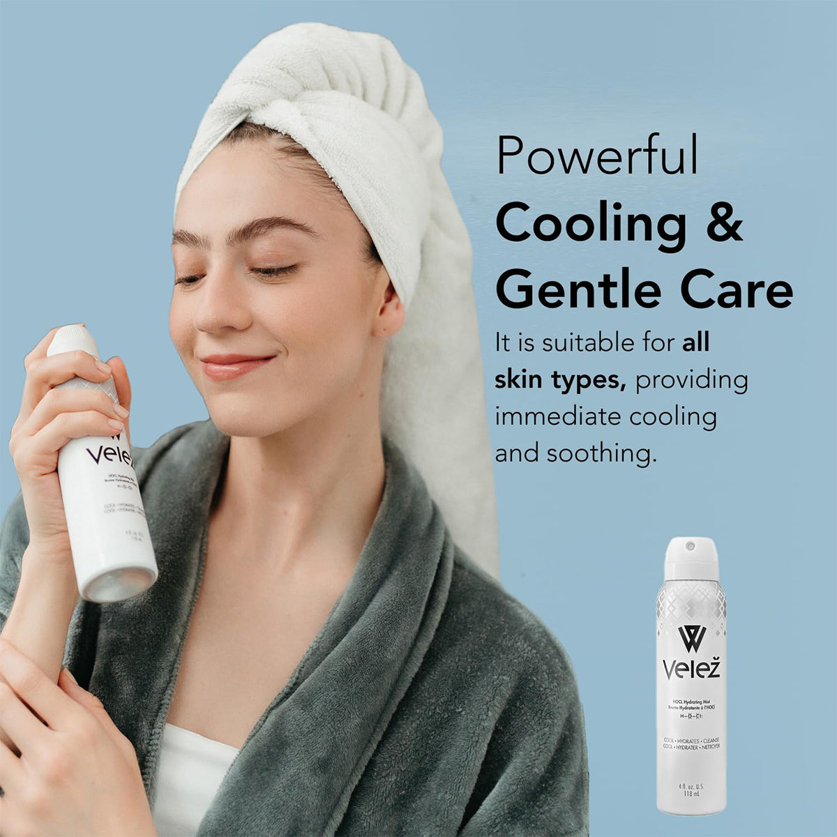 A woman in a robe sprays Velez HOCL Hydrating Mist on her face, wrapped in a towel. The blue backdrop accentuates the cooling and gentle care enriched with hypochlorous acid, suitable for all skin types. A can of this Velez skincare essential is also shown.