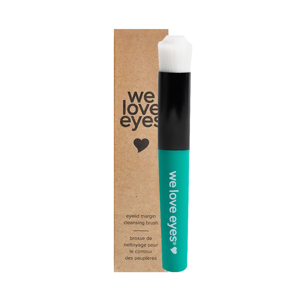 The We Love Eyes Eyelid Margin Cleansing Brush, with green and black handle and white bristles, stands upright for effective cleansing. It comes in brown packaging labeled We Love Eyes in white text with a small heart icon.