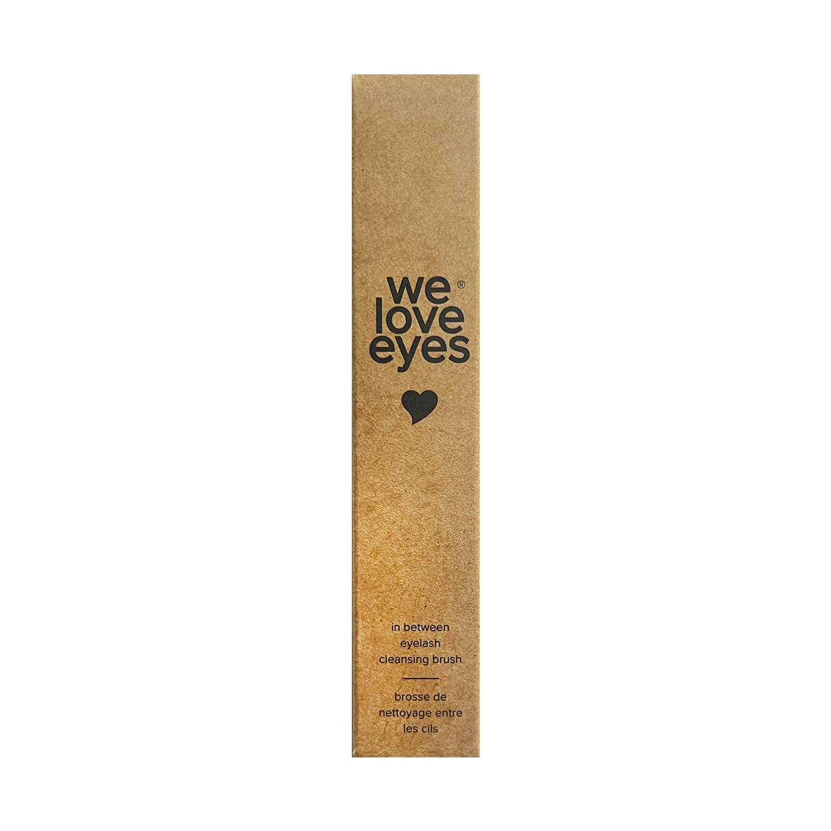 A tall, rectangular brown cardboard box with We Love Eyes ♥ in black text displays the We Love Eyes In Between Eyelash Cleansing Brush, perfect for maintaining your eyelash margin. Instructions are available in English and French.