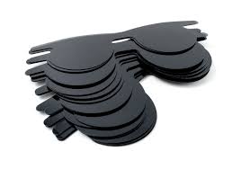 A stack of MedPharma USA Post Mydriatic Glasses, Slip-In, featuring a black oval design with side tabs for UV protection. Fan-shaped and neatly packed in 100/box.