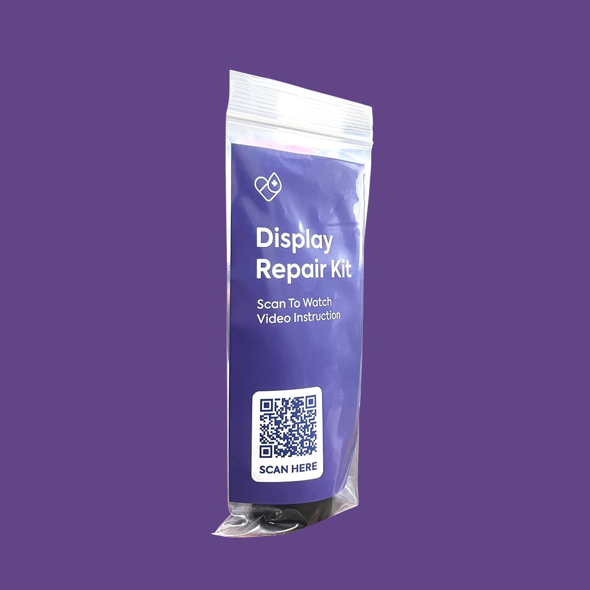 A purple display repair kit package from DryEye Rescue sits against a matching backdrop, featuring a SCAN HERE QR code. The text reads Display Repair Kit and Scan To Watch Video Instructions. Its ideal for precise work, adding isopropyl alcohol to your toolkit.