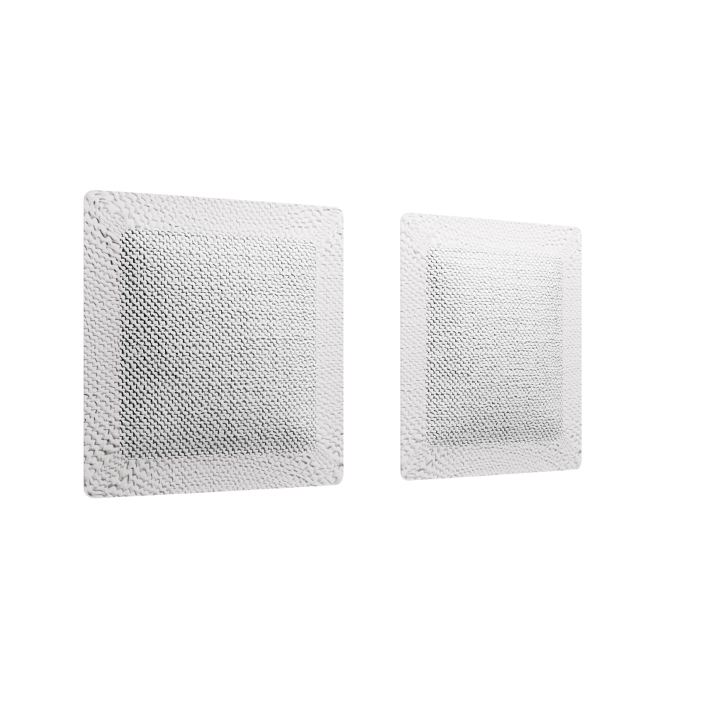 Two square adhesive medical bandages with textured surfaces displayed against a black background. They are positioned side by side, each featuring a central absorbent pad.