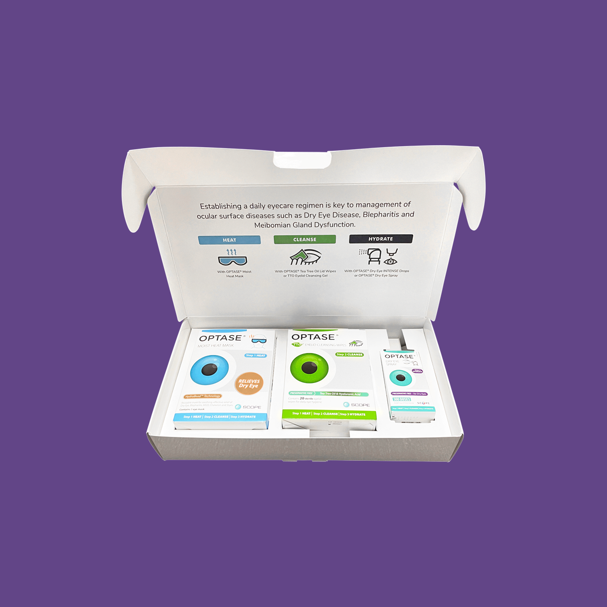 The Optase Dry Eye Kit is displayed in an open white box on a purple background, featuring a Heat Mask, Tea Tree Wipes for soothing relief, Lubricant Spray, and informational text inside the lid.