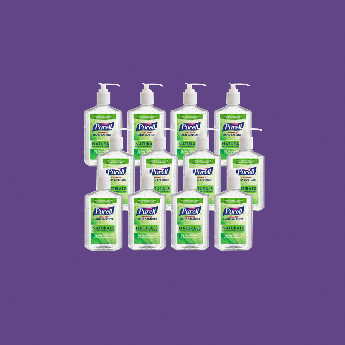 Twelve bottles of PURELL Naturals Advanced Hand Sanitizer with pump dispensers form a pyramid against a purple backdrop. Each bottle, labeled in green, features Skin Conditioners and Essential Oils ideal for workplaces.