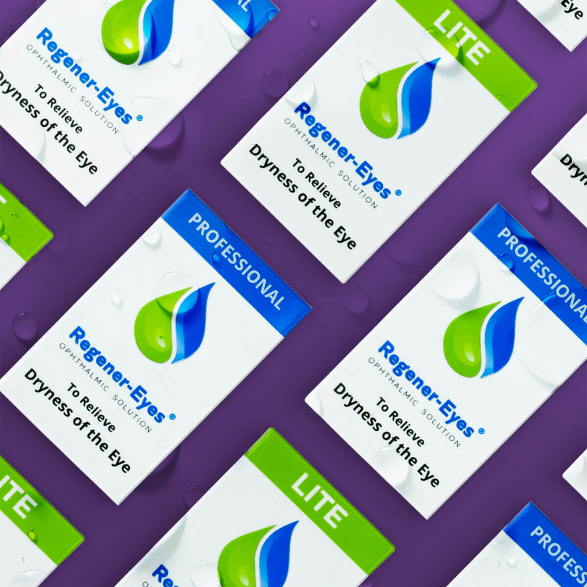 Boxes of Regener-Eyes eye drops, labeled PROFESSIONAL and LITE, are arranged on a purple surface. Each box has a green and blue droplet logo, and water droplets are scattered on the surface.