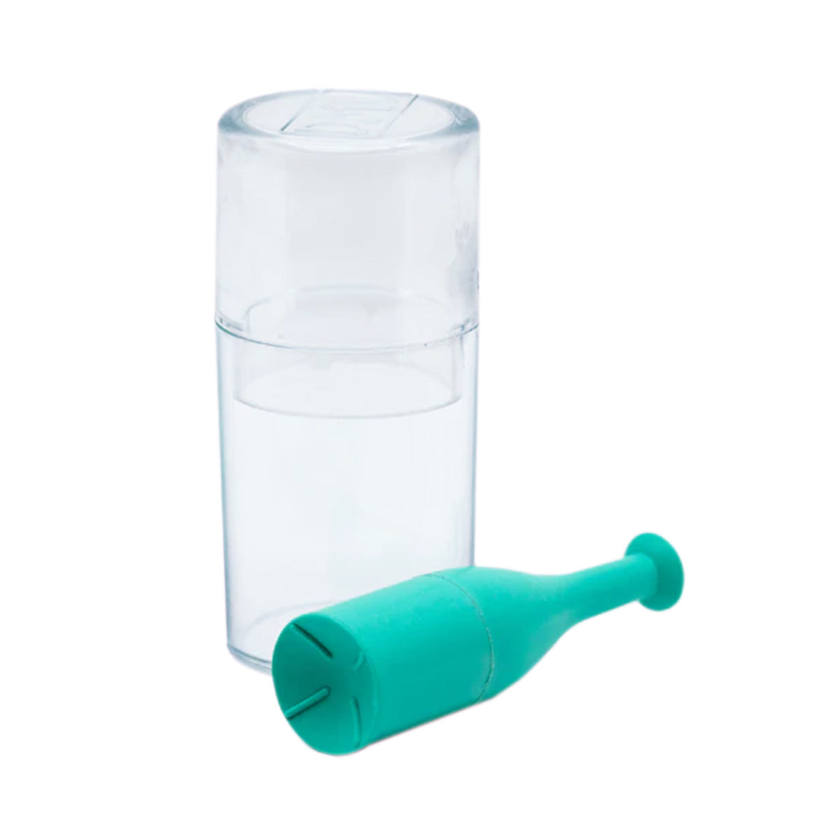 A clear cylindrical container is beside a small turquoise manual chopper with a plunger and blade, designed for easy food prep, akin to the precision of using the DMV Versa Contact Lens Insertion and Removal Tool (5-Pack Green) by DMV.