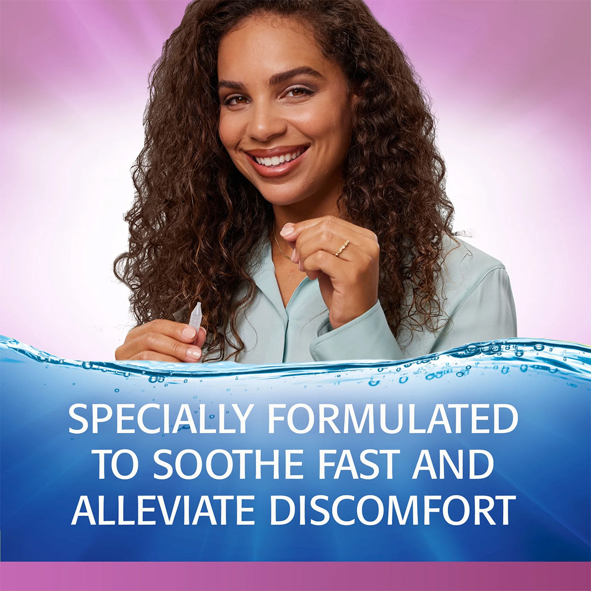 A curly-haired individual smiles, holding a vial against a pink-purple backdrop. Below is the text: Refresh Celluvisc by Abbvie, formulated to soothe and alleviate dry eye discomfort. Water waves are depicted at the bottom.