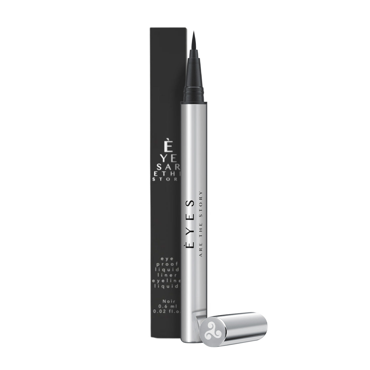 The Eyes are the Story Eye Proof Liquid Eyeliner (0.6ml) features a silver pen with a black cap, displayed beside its black box. Labeled EYES, it offers a highly pigmented, vegan, and cruelty-free formula with a fine felt tip for precise application. The cap is off and set to the side.