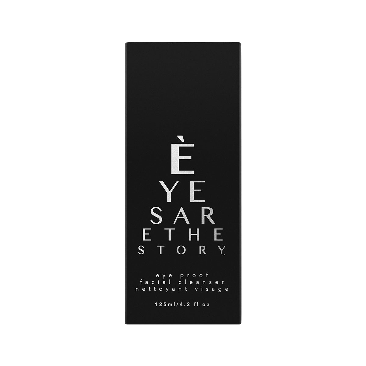 A sleek black rectangular box contains the Eyes are the Story Eye Proof Facial Cleanser. It features white text with EYE SA R THE STORY and an accented È at the top, plus details like olive leaf extract, and is labeled 125ml/4.2 fl oz at the bottom.