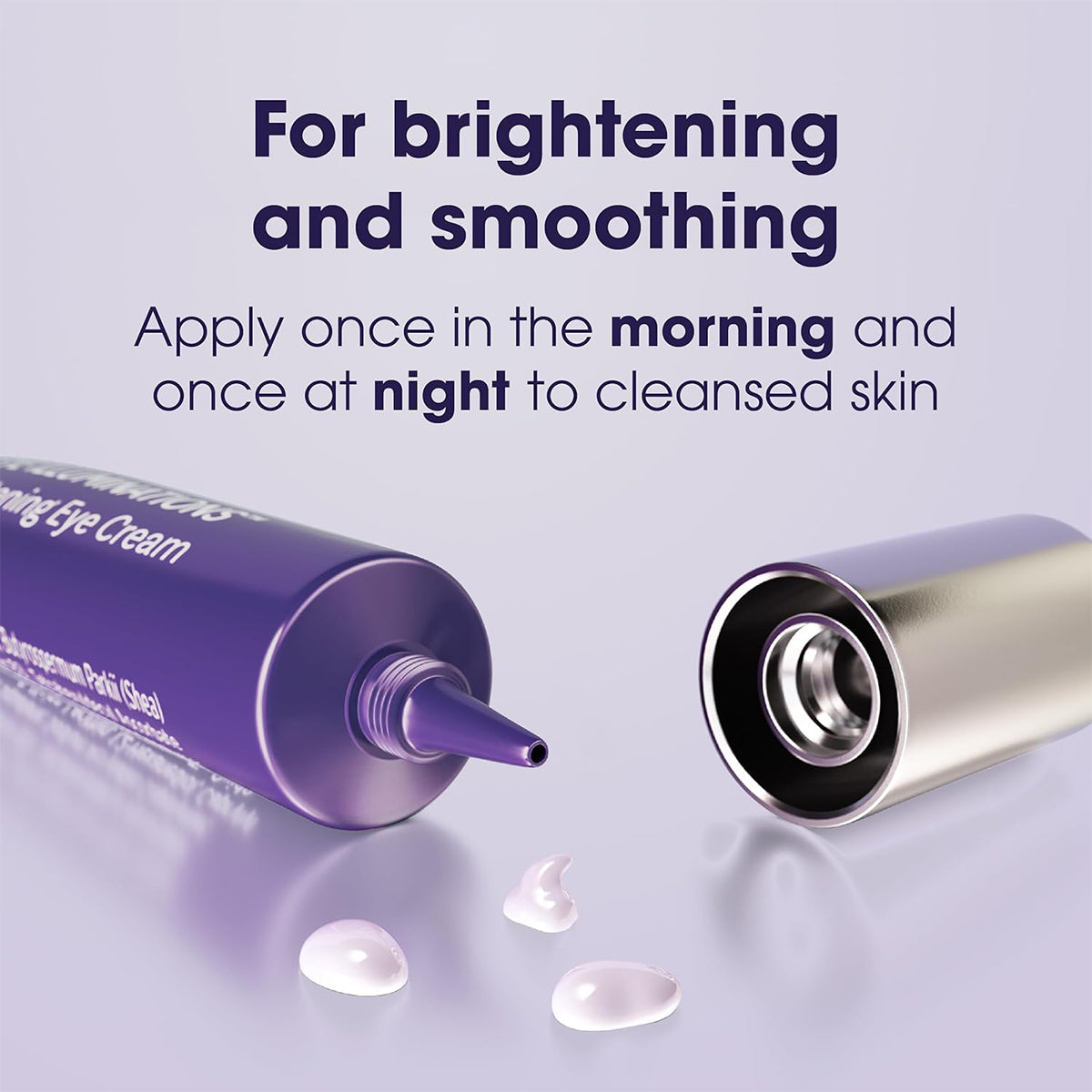 A purple tube of Bausch & Lombs LUMIFY Eye Illuminations Hydra-Gel Brightening Eye Cream, cap off to reveal a pointed applicator, rests beside three dollops. Text reads: Brighten and smooth under-eye skin. Apply morning and night on cleansed skin for radiant results.