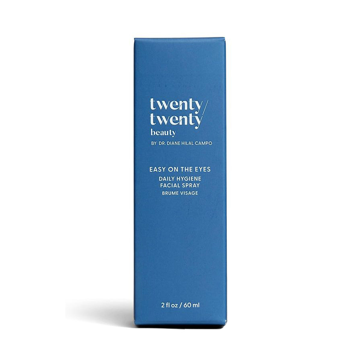 The blue rectangular box reads: Twenty Twenty by Dr. Diane Hilal-Campo. Easy on the Eyes Daily Hygiene Facial Spray. This calming mist promotes eye and skin health with a volume of 2 fl oz / 60 ml.