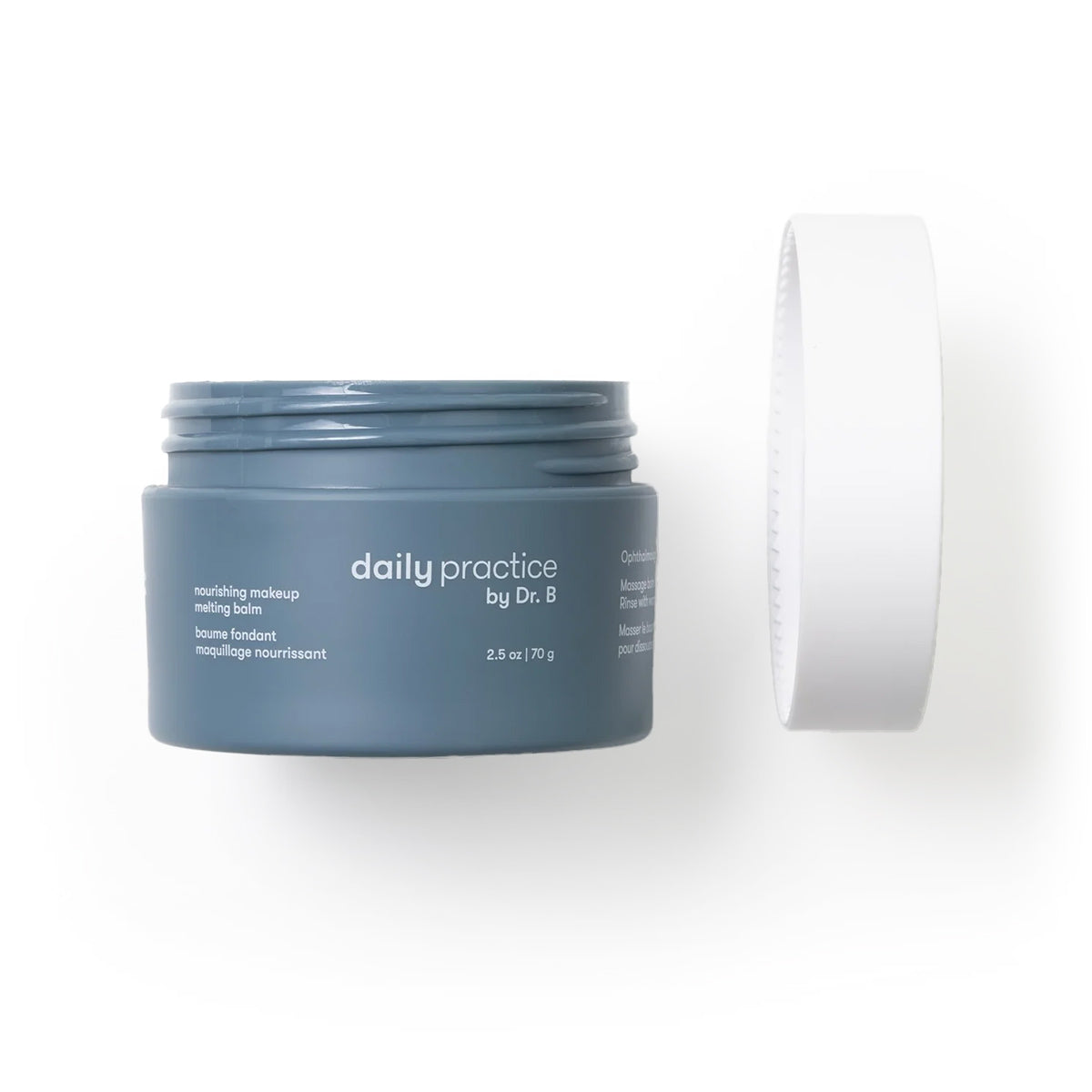 The image shows a gray container with the label Daily Practice and a white lid floating above. It contains the ophthalmologist-developed Daily Practice Nourishing Makeup Melting Balm (70g) designed for effortless makeup removal, set against a white background.