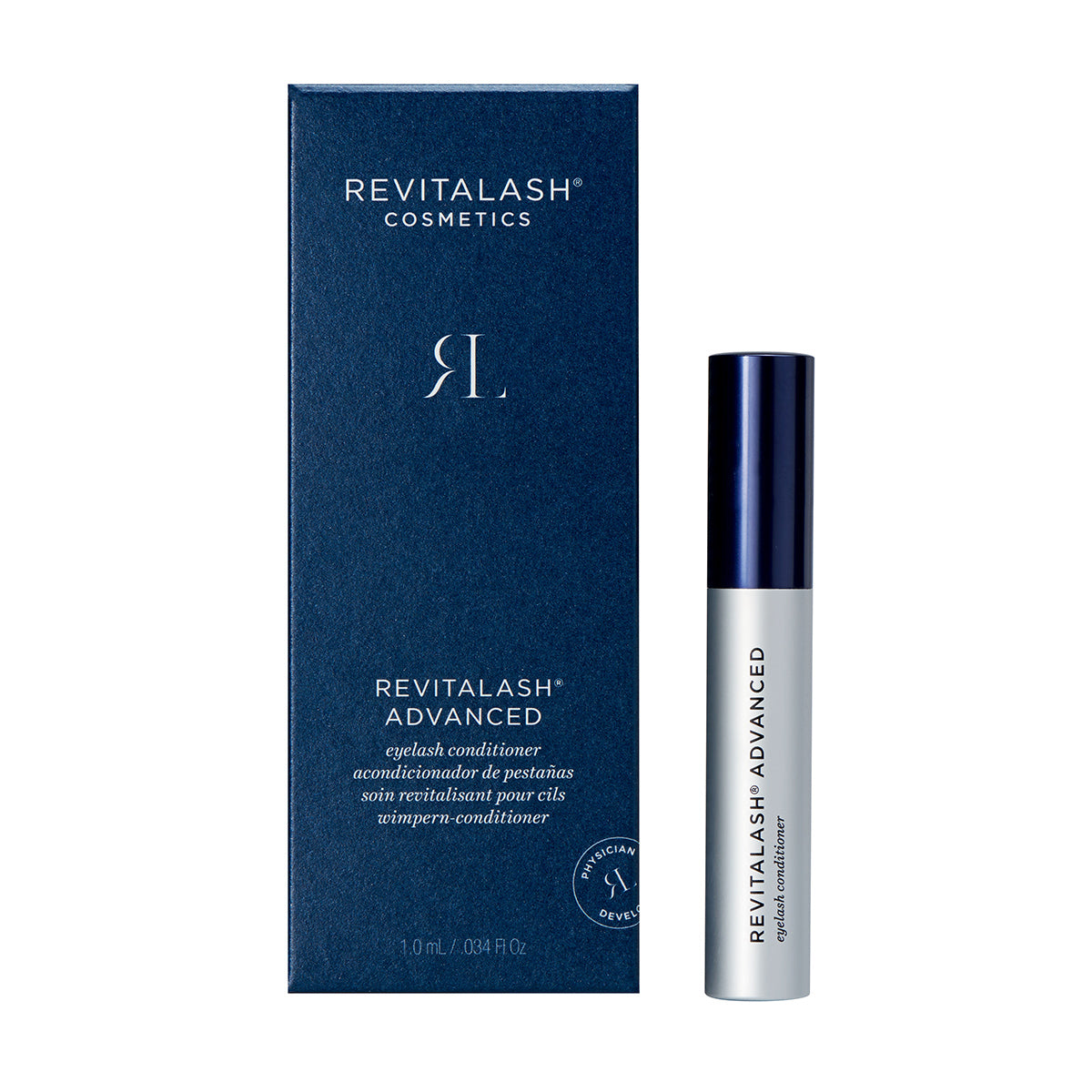 RevitaLash Advanced Eyelash Conditioner and Enhancing Serum is presented in a sleek metallic tube alongside a dark blue box. Both feature the elegant RevitaLash branding and product details in English and French.