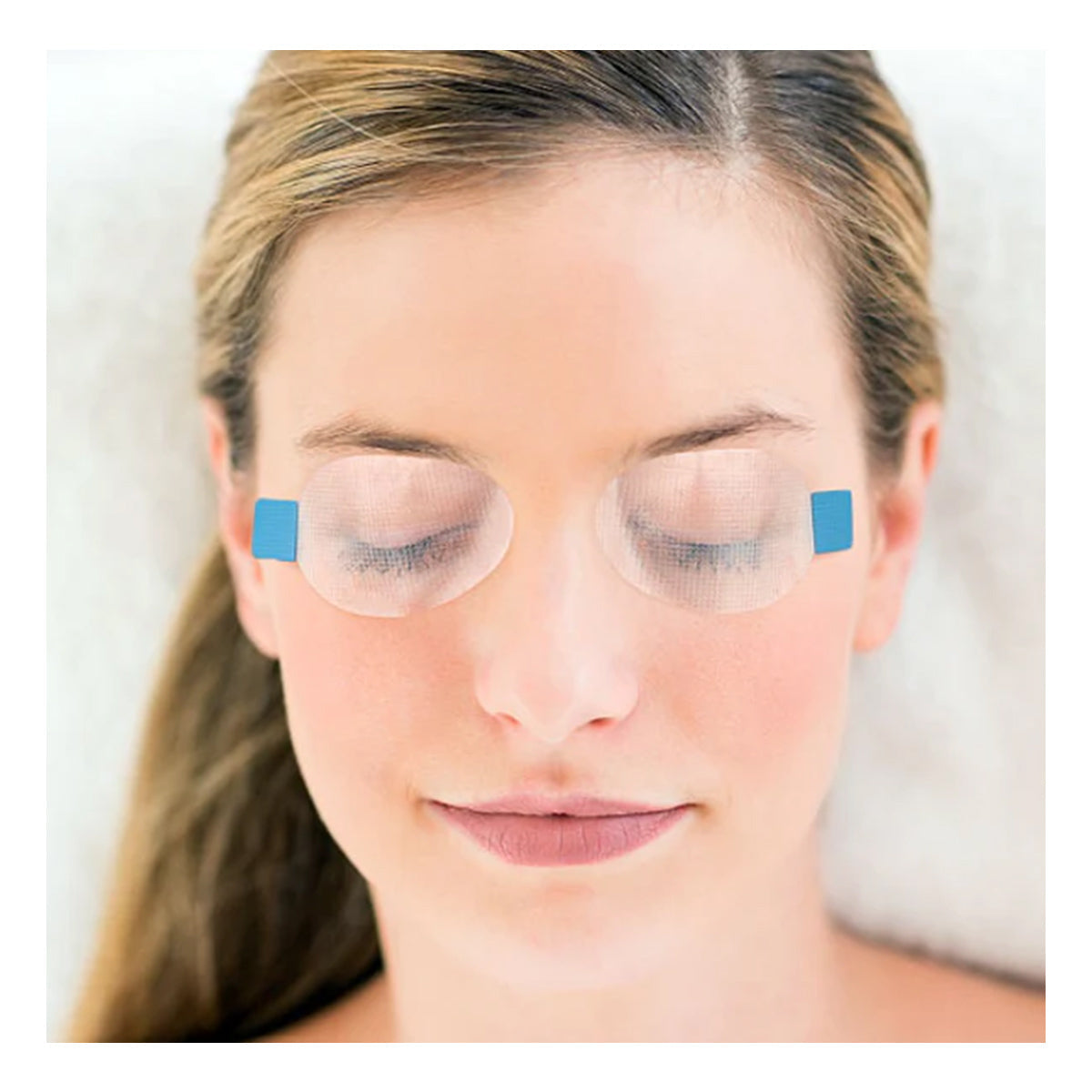 A woman with long hair lies peacefully, using Ophthalmic Resources Partners SleepTite, SleepRite daily nighttime lid closure device (30ct), appearing relaxed and content as if experiencing ultimate eye comfort from hypoallergenic lid seals.