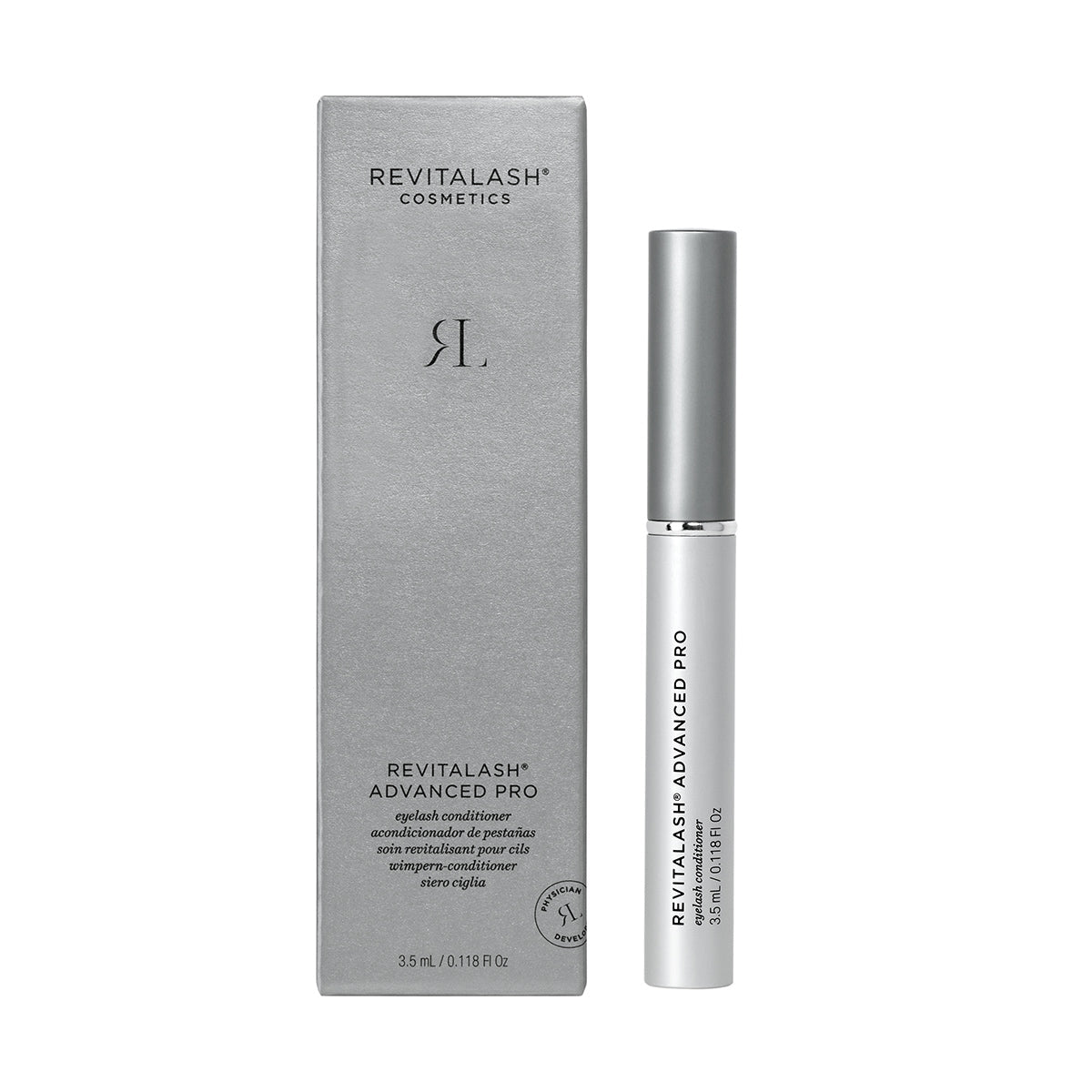 A silver box labeled RevitaLash Advanced PRO Eyelash Conditioner and Enhancing Serum stands next to a sleek silver tube, both featuring the RevitaLash logo and highlighting the lash-enhancing formula, 3.5mL size for a 6-month supply.