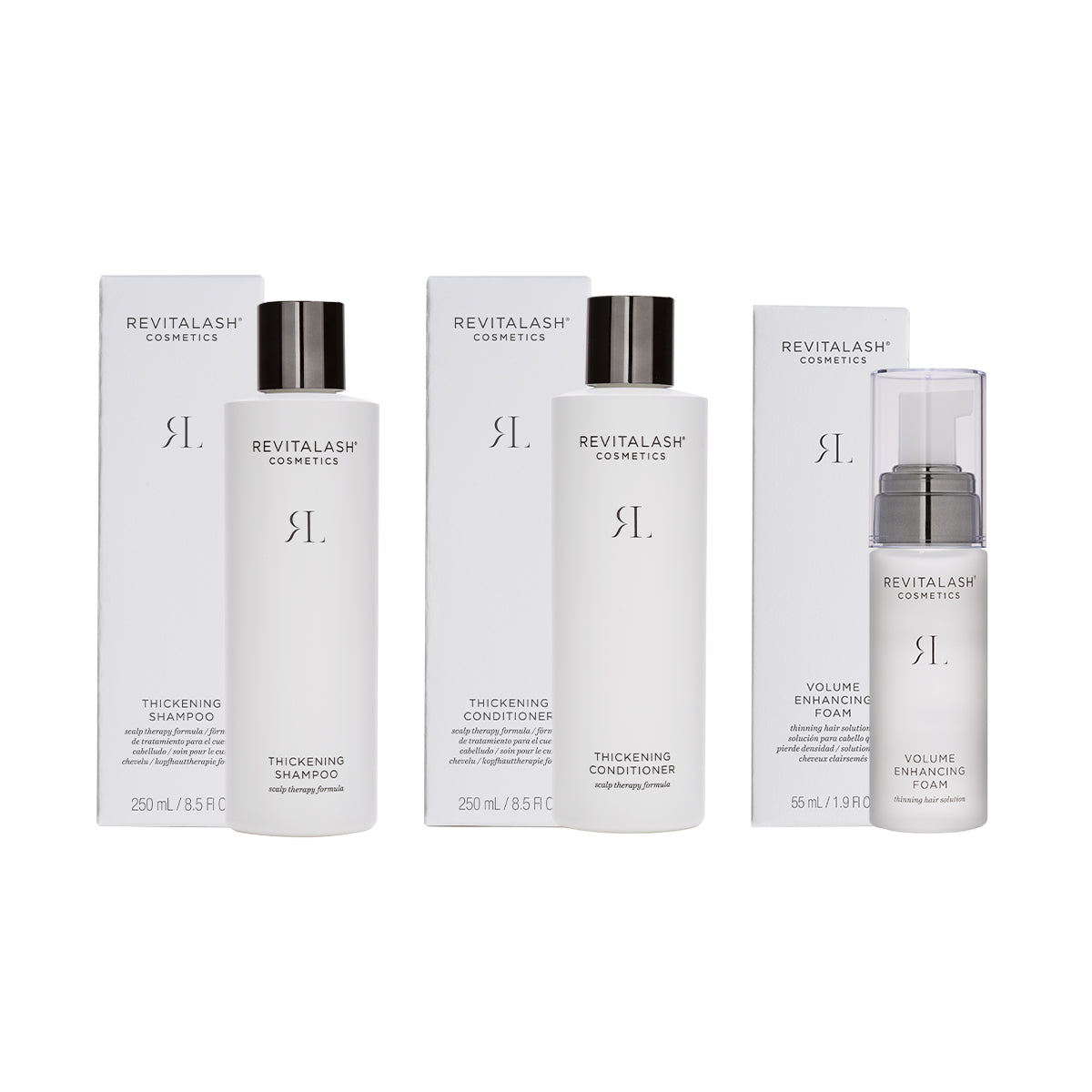 Experience the RevitaLash Volumizing Hair Collection Bundle with two 250 ml bottles of Thickening Shampoo and Conditioner, plus a 55 ml Volume Enhancing Foam. These white bottles, with subtle black text, add elegance to any beauty collection.