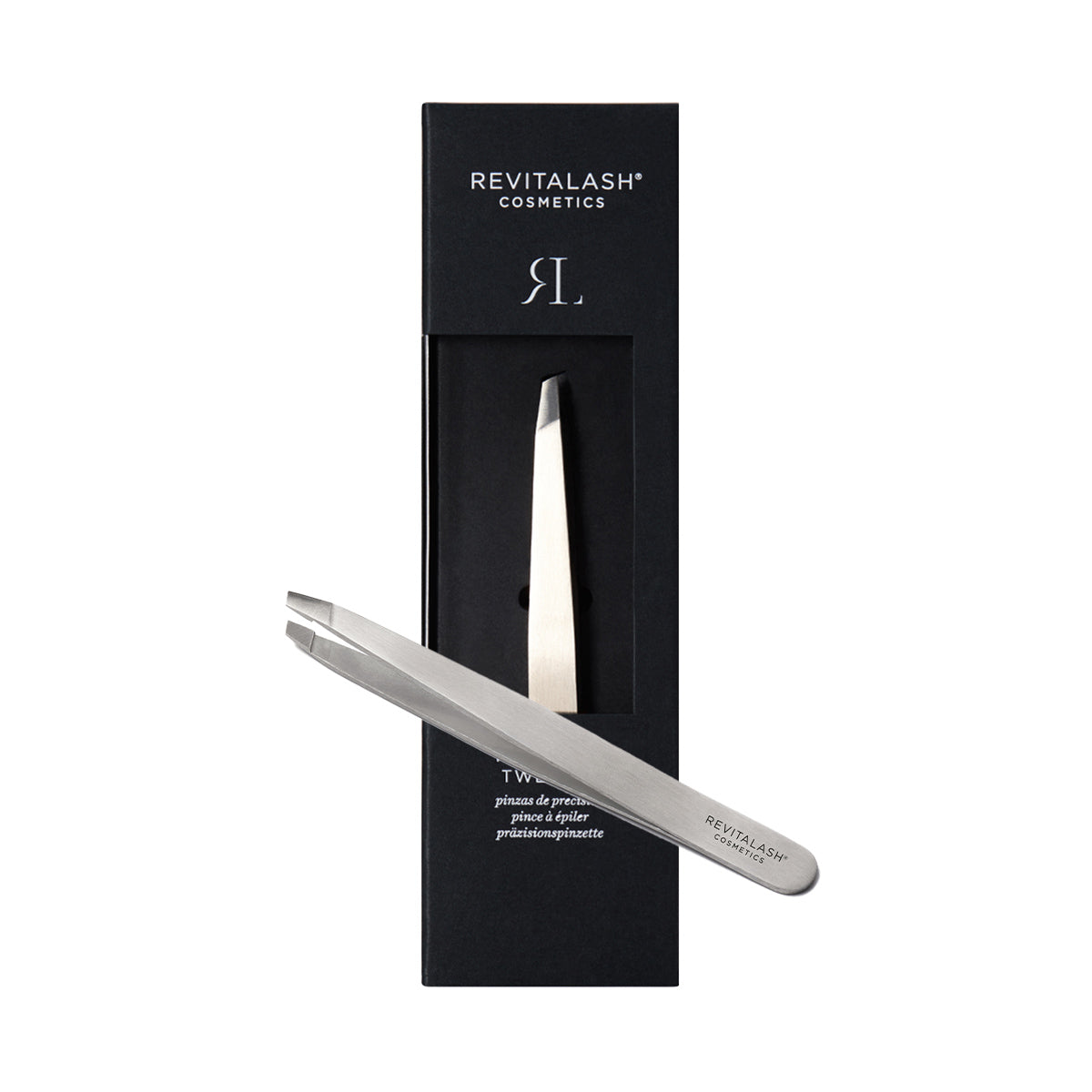 The RevitaLash Precision Tweezer, a professional-grade silver tool from RevitaLash, is elegantly showcased with its partially open black packaging box. The angled design shines against the interior, emphasizing text that highlights the brand and product name, ideal for precision hair removal.