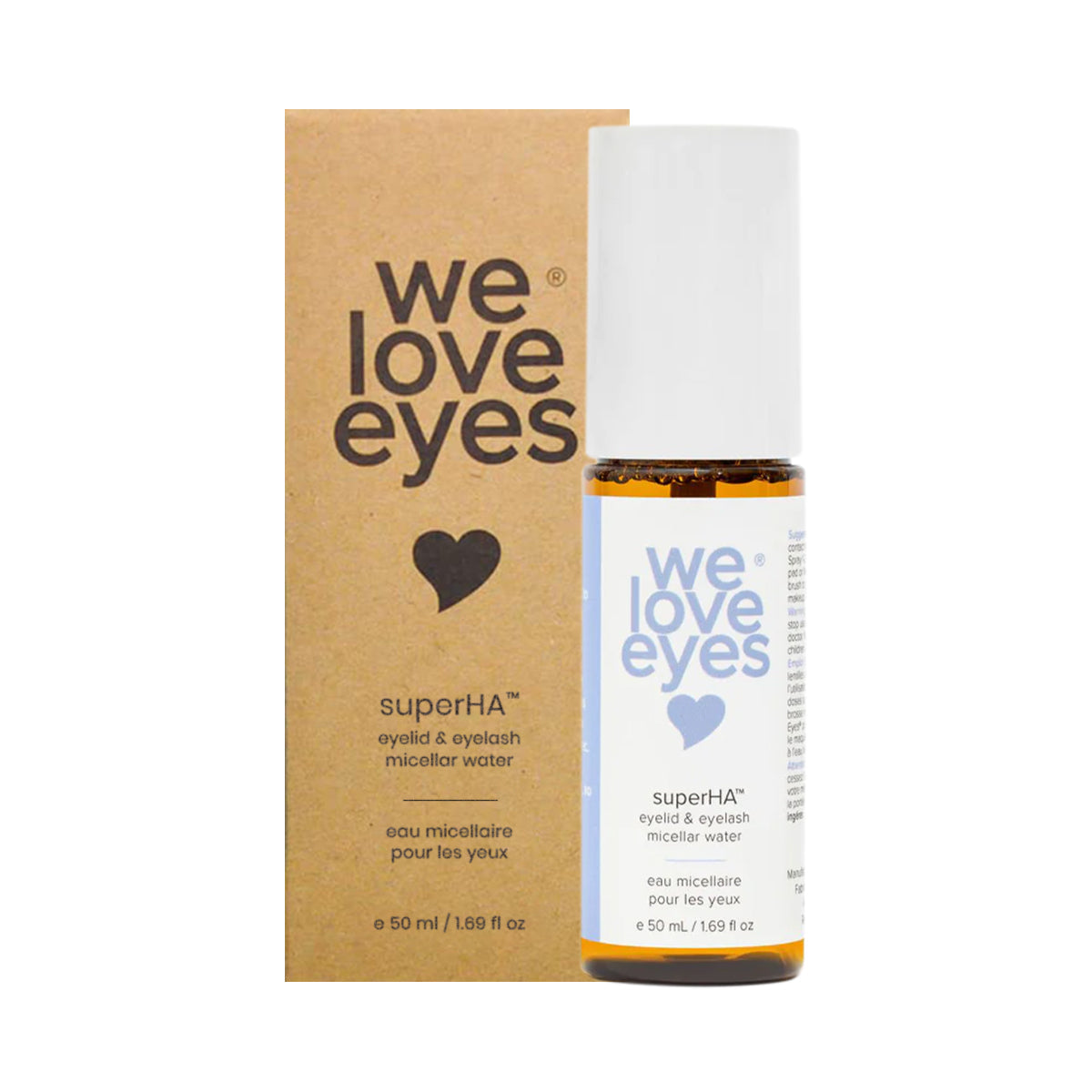 A 50mL bottle of We Love Eyes superHA Eyelid & Eyelash Micellar Water Make-up Remover, featuring a white cap and minimalistic label, stands in front of its brown packaging box. Its formulated with soothing tea tree water for gentle yet effective eye makeup removal while caring for the eyelid skin barrier.