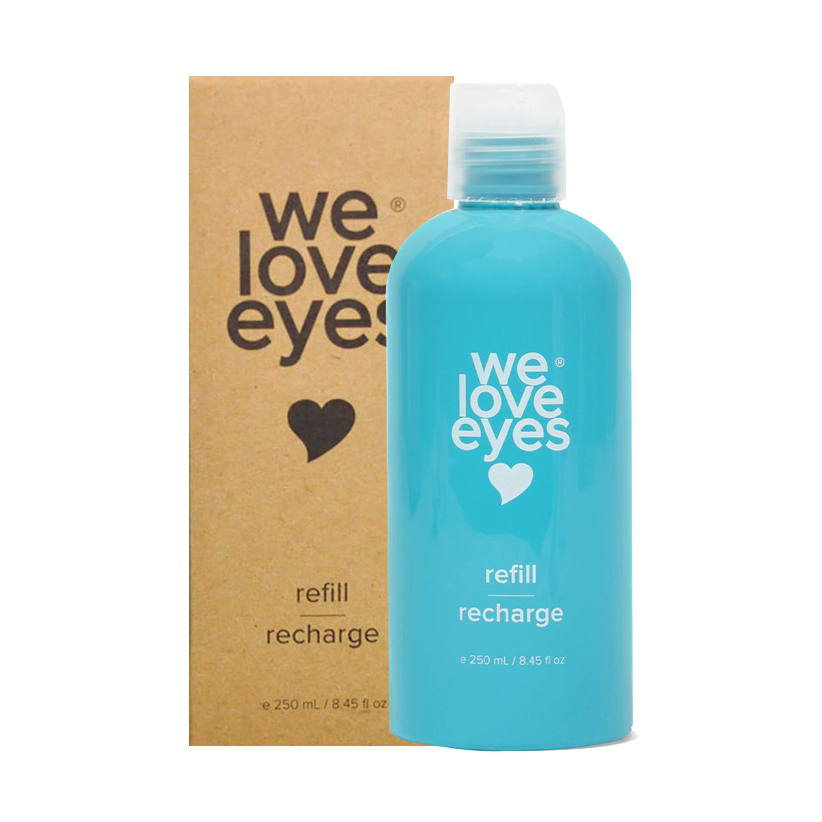 A 250 mL blue bottle of We Love Eyes Tea Tree Eyelid Foaming Cleanser Refill, made from post-consumer recycled plastic, is paired with a brown cardboard box featuring the same text and a heart logo, promoting eco-friendly beauty solutions.