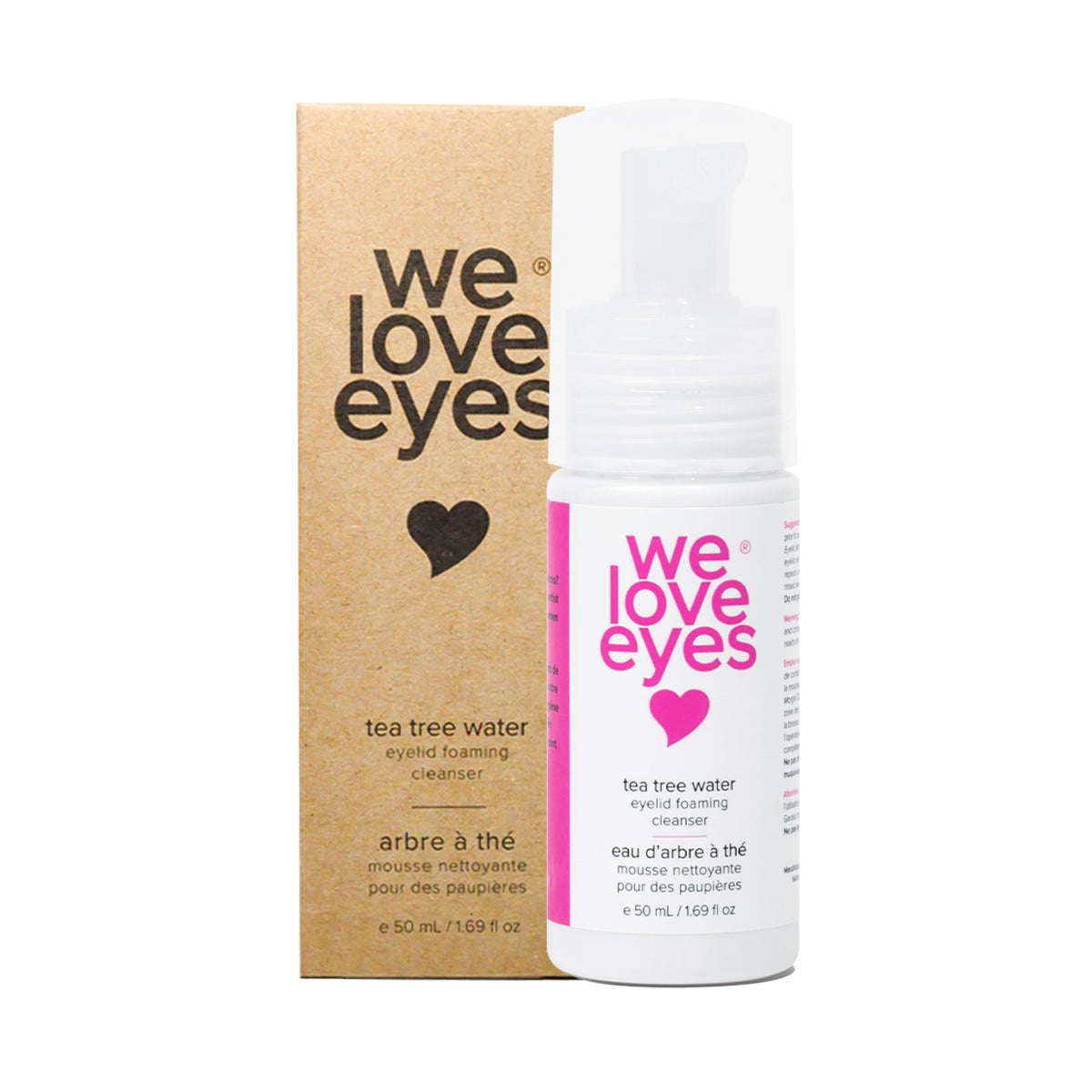 The We Love Eyes Tea Tree Water Eyelid Foaming Cleanser is displayed in front of its brown box. This pH-balanced cleansing spray features bold pink text and is crafted for optimal eye hygiene.