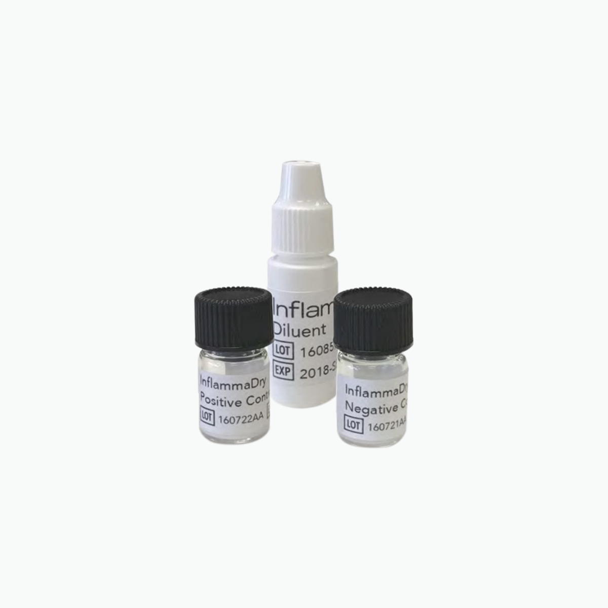 The Quidel InflammaDry Control Set on a white background includes three small containers: two with black caps labeled Positive and Negative Control, and one white container labeled Diluent with a dropper cap, essential for detecting MMP-9 protein levels in InflammaDry tests, aiding dry eye diagnosis.